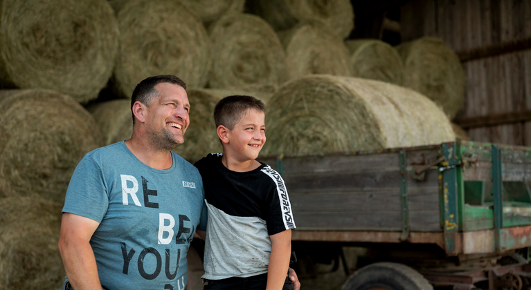 Father and son in farm