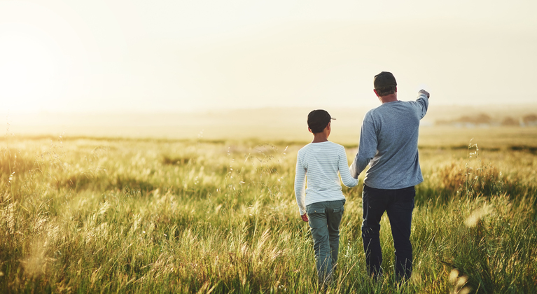 Father and son on a farm