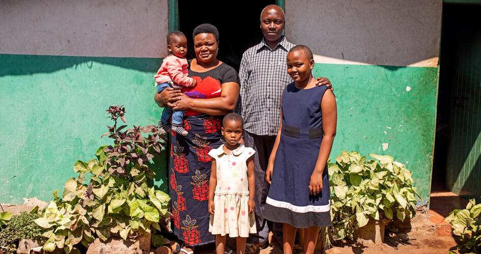 Jonathan Hudson Mujema with his family